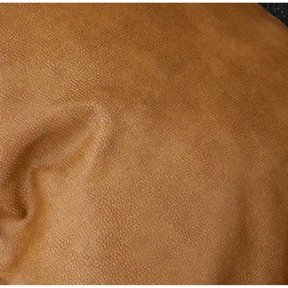Close-up of tan fabric upholstery texture