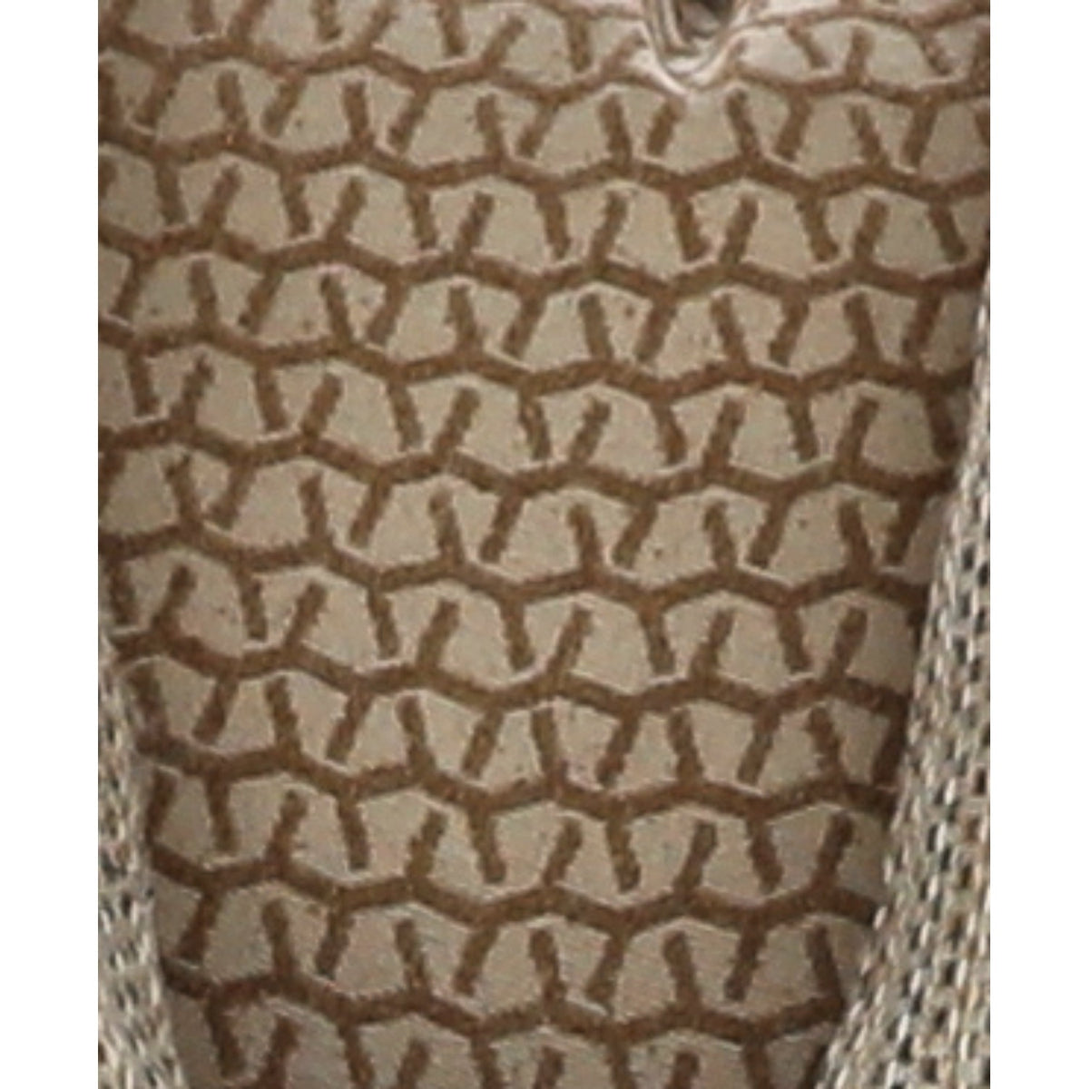 Close-up of tan and brown geometric woven upholstery