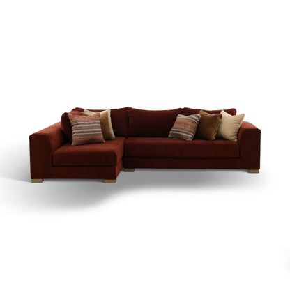 Upholstered L-shaped sectional sofa in dark brown with five decorative throw pillows