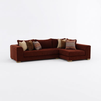 Brown sectional sofa with chaise corner and multiple throw pillows