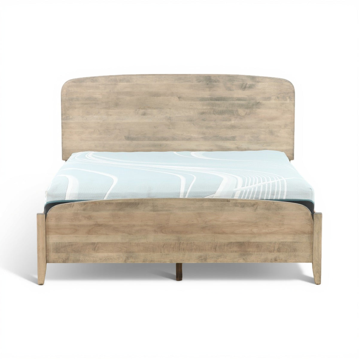 Artisan platform bed with gray-wash frame and blue-patterned comforter