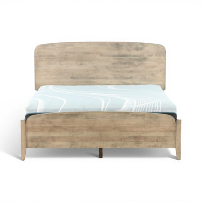 Artisan platform bed with gray-wash frame and blue-patterned comforter