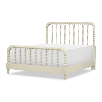 Cream Lakehouse panel bed with beadboard headboard, arched posts, and paneled side rails.