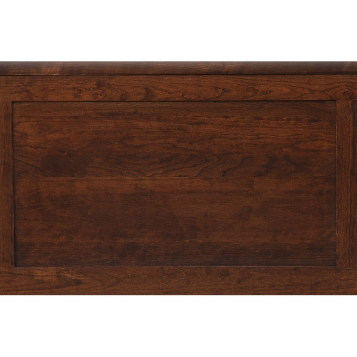 Close-up of brown bed front panel showing engraved wood grain
