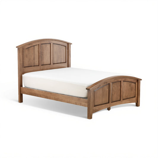Wood platform bed with curved arch headboard, white mattress and paneled sides