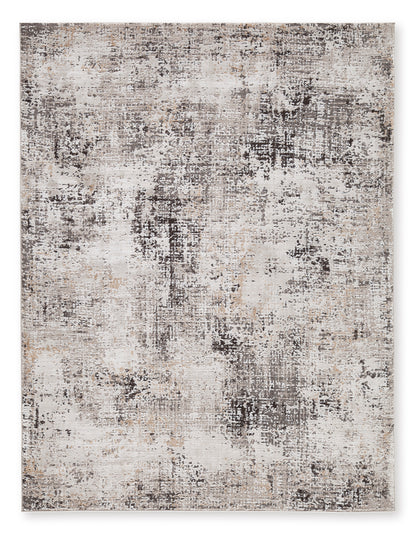 Distressed abstract area rug, light beige with gray and dark speckled pattern