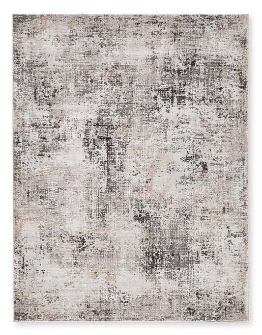 Distressed abstract area rug, light beige with gray and dark speckled pattern