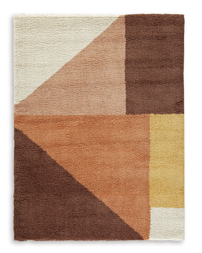 Square area rug with cream, rust, brown, and yellow geometric patchwork pattern