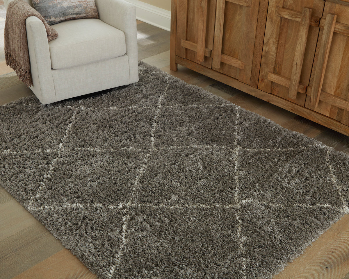 Gray shag rug with large diamond pattern in a living room setting
