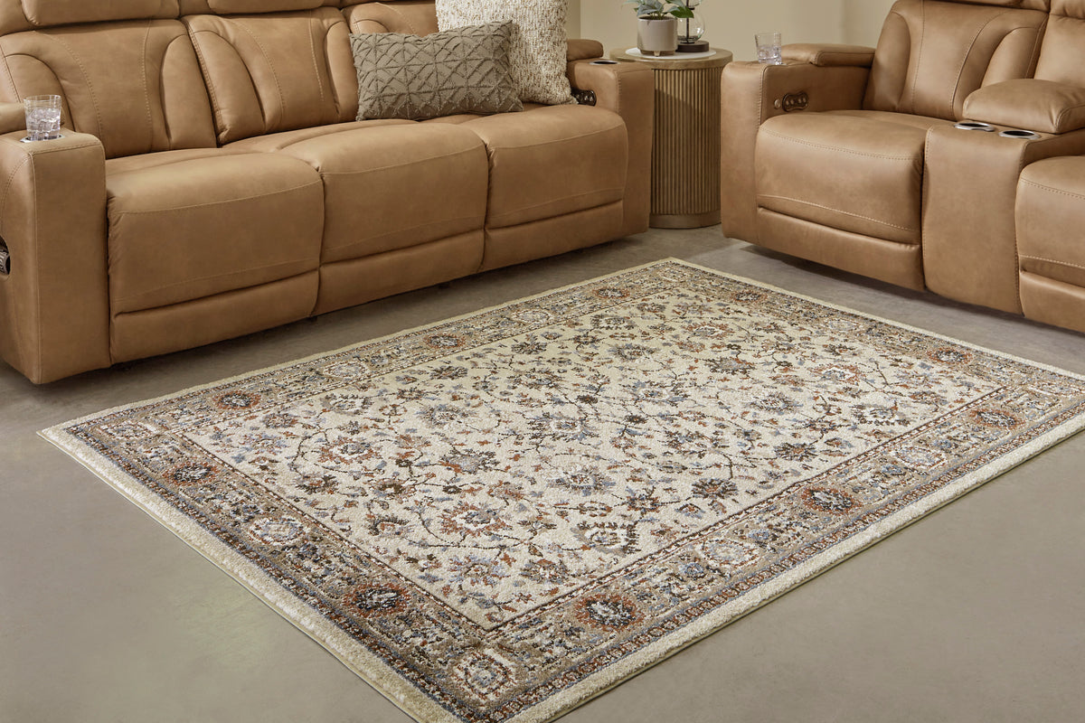 Medium vintage-style rug with beige, blue, rust border and medallion pattern
