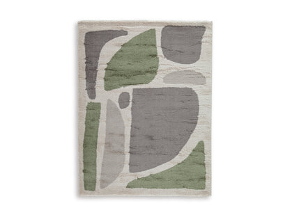 Ashley Anburgh rug close-up with abstract blocks in green, gray, and cream