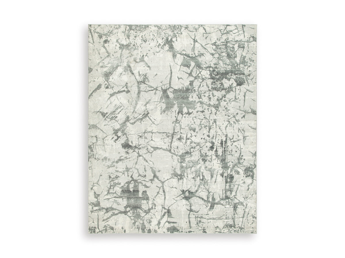 Ashley Tobinbury Washable Rug with an allover gray abstract pattern on ivory