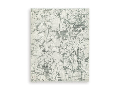 Ashley Tobinbury Washable Rug with an allover gray abstract pattern on ivory
