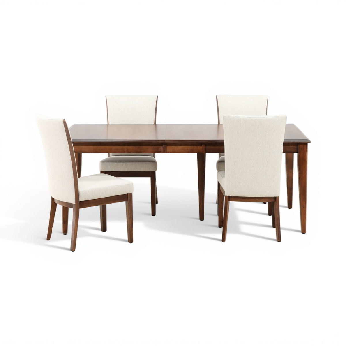 Dining set featuring dark wood table and four cream upholstered chairs around it