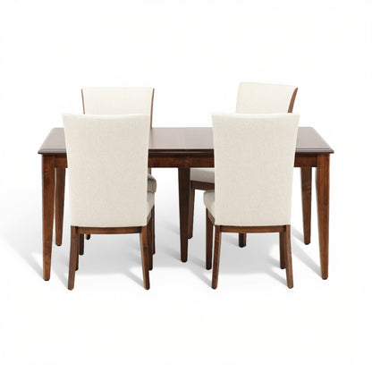 Rectangular dining table with two front and two back beige upholstered chairs