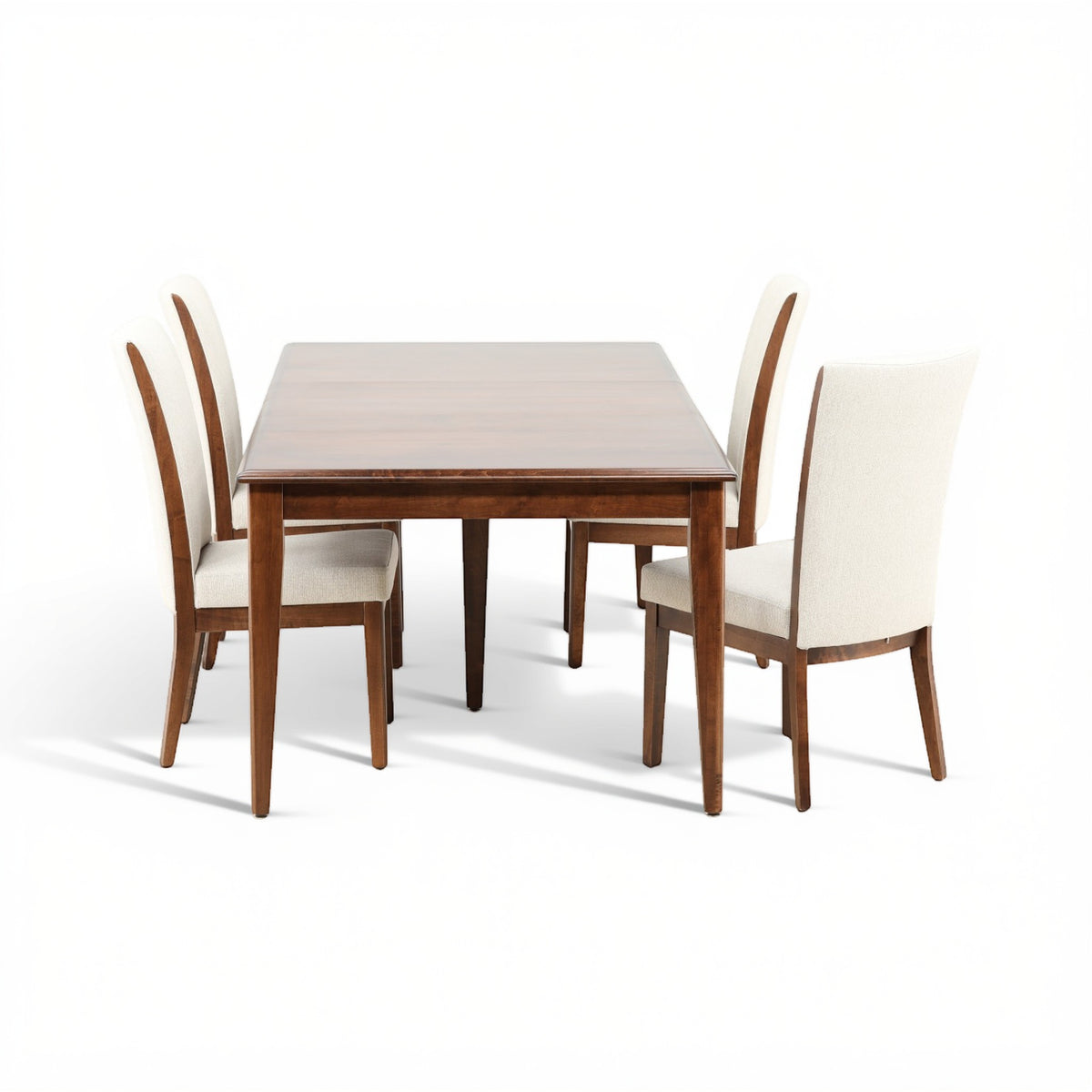 View of wooden dining table and four cream upholstered chairs, five-piece set