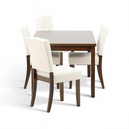 Dark wood dining table with four white tufted upholstered chairs and center chair