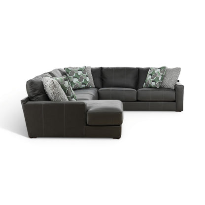 Dark gray sectional with right chaise and camo accent pillows