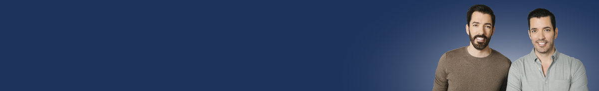 Two men standing side by side against a solid dark blue background, with the left side of the image featuring a large blank blue space.