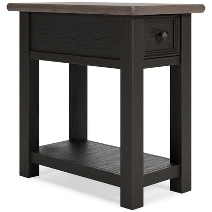 Dark wood chairside end table with drawer face and lower shelf, side view