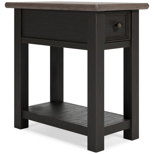 Dark wood chairside end table with drawer face and lower shelf, side view