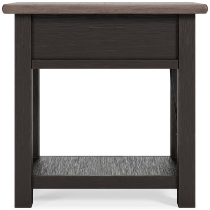 Dark wood chairside end table with closed drawer front and lower open shelf