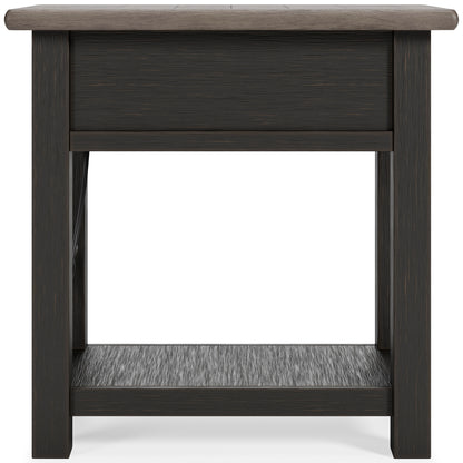 Dark wood chairside end table with closed drawer front and lower open shelf