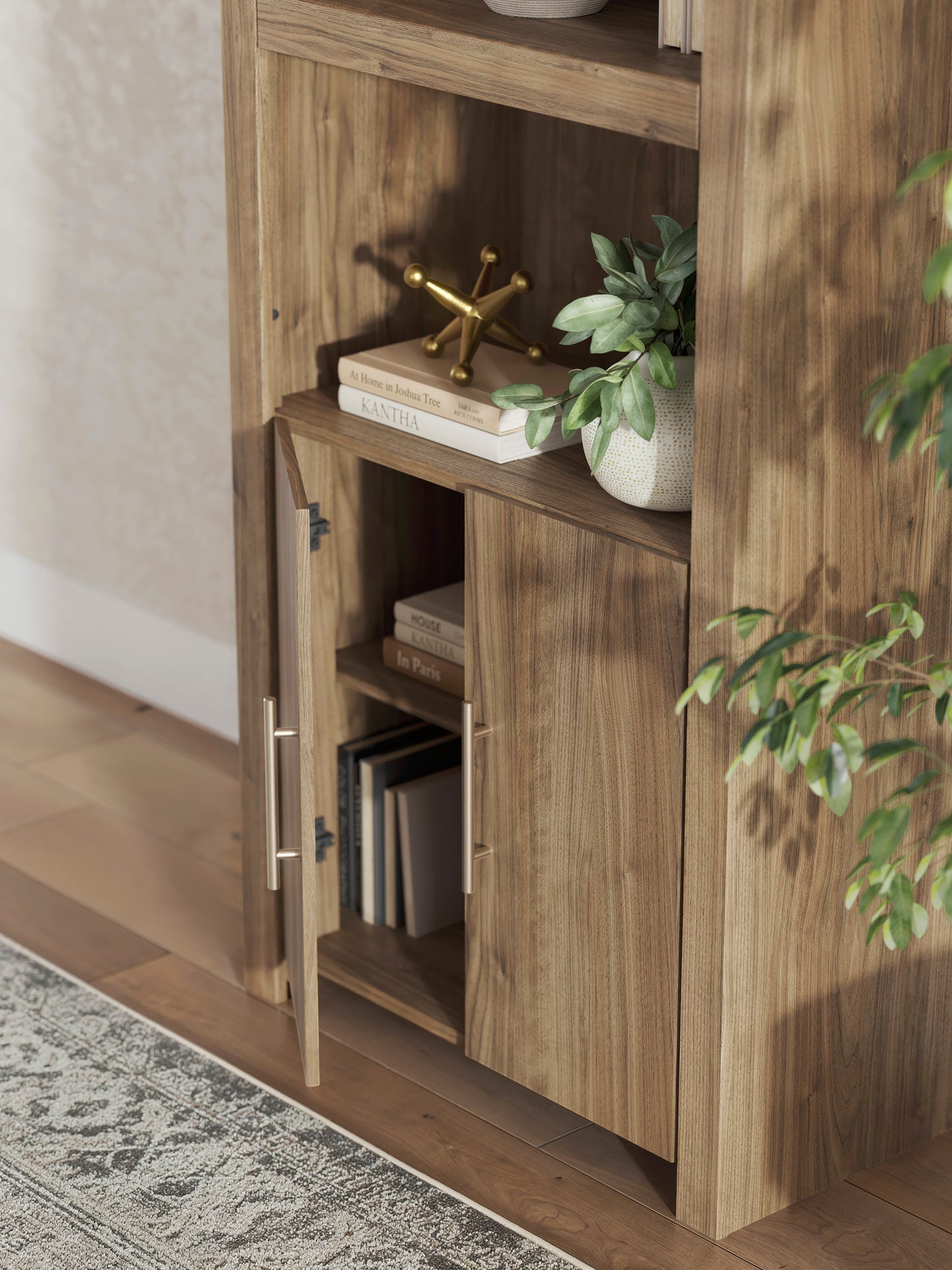 Wood display cabinet corner detail with open shelf section and door hardware
