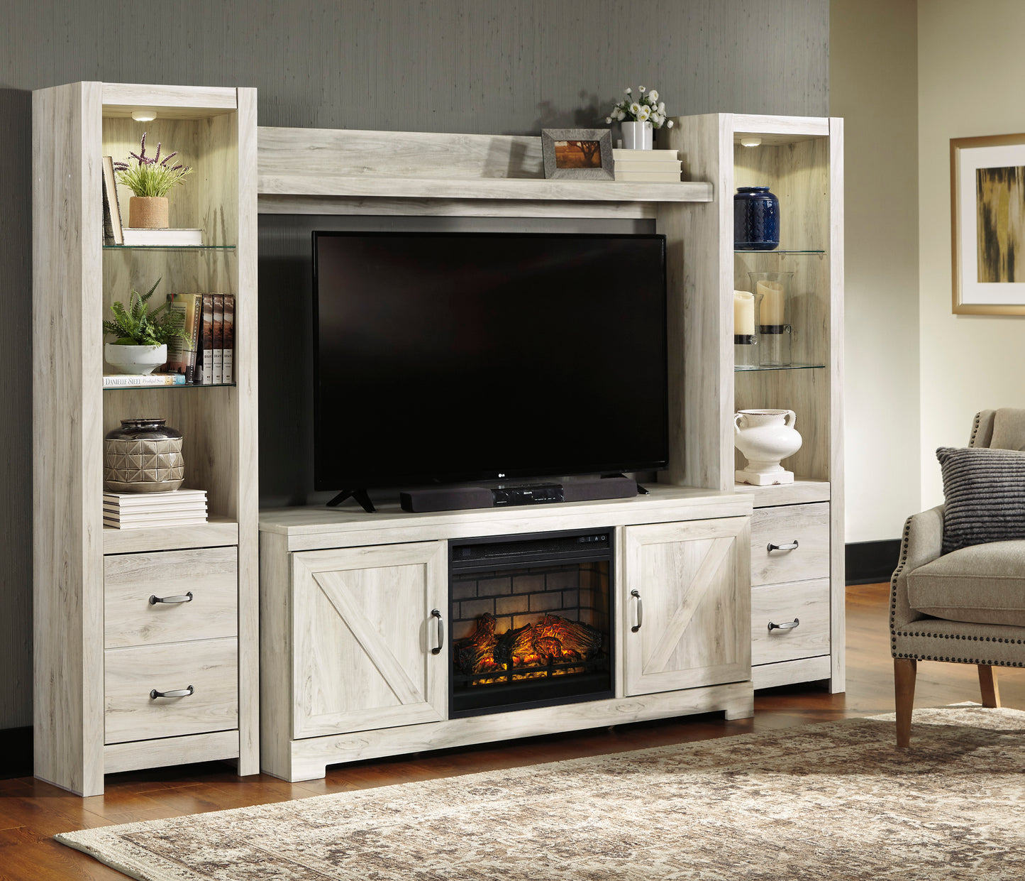 Bellaby 4-Piece Entertainment Center with Electric Log Fireplace