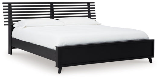 Danziar King Slat Panel Bed With Framed Panel Footboard