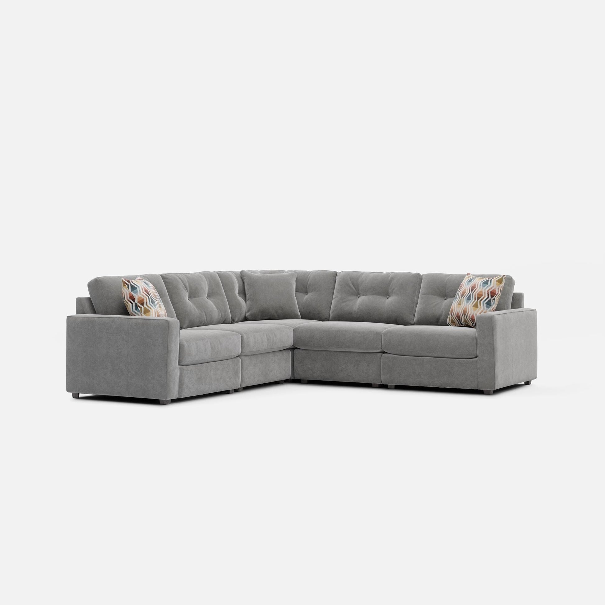 Gray modular sectional sofa with tufted backrests and boxy seat cushions
