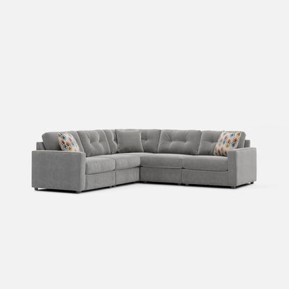 Gray modular sectional sofa with tufted backrests and boxy seat cushions