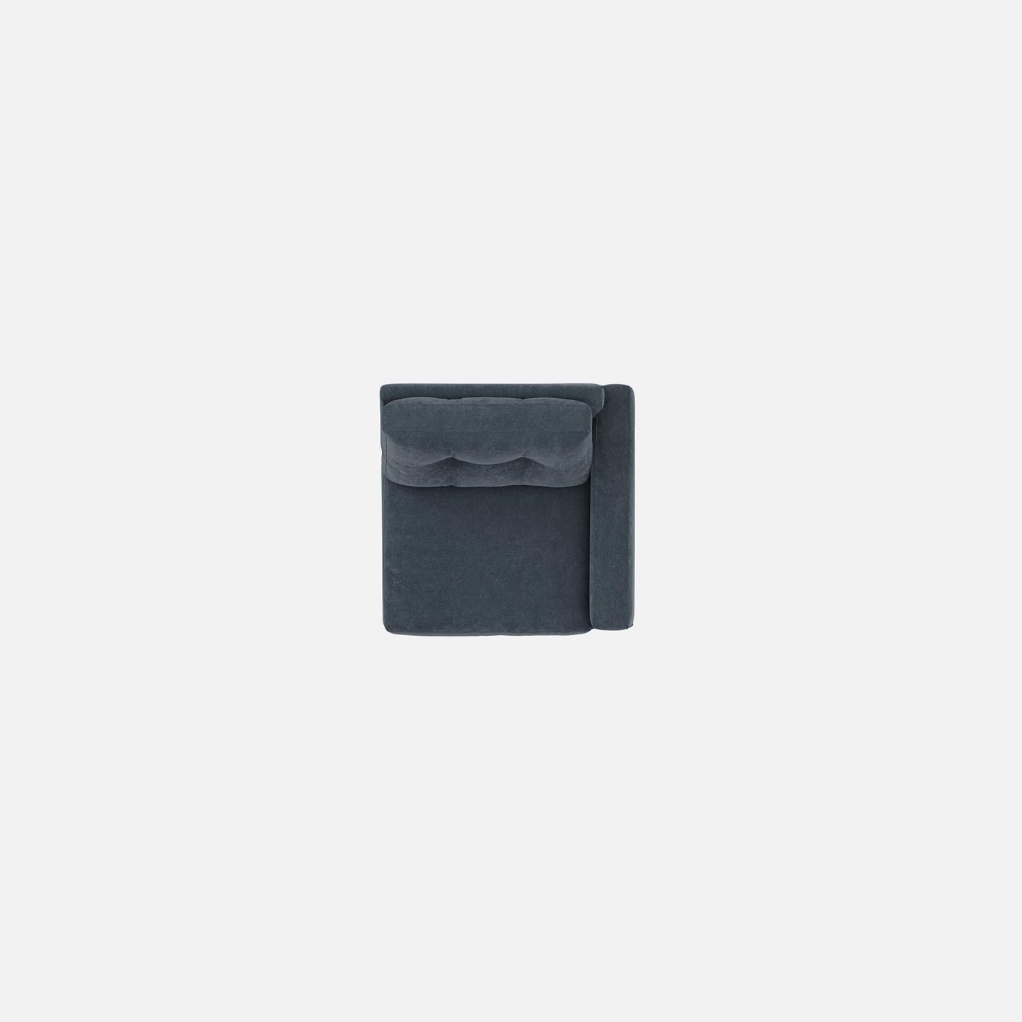 Upholstered armchair in dark navy, close view of backrest with tufted cushioning
