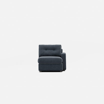 Dark navy modular one-chaise sectional chair with tufted backrest