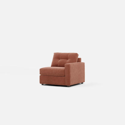 Upholstered armchair in terracotta, side view with tufted headrest and cushioned seat