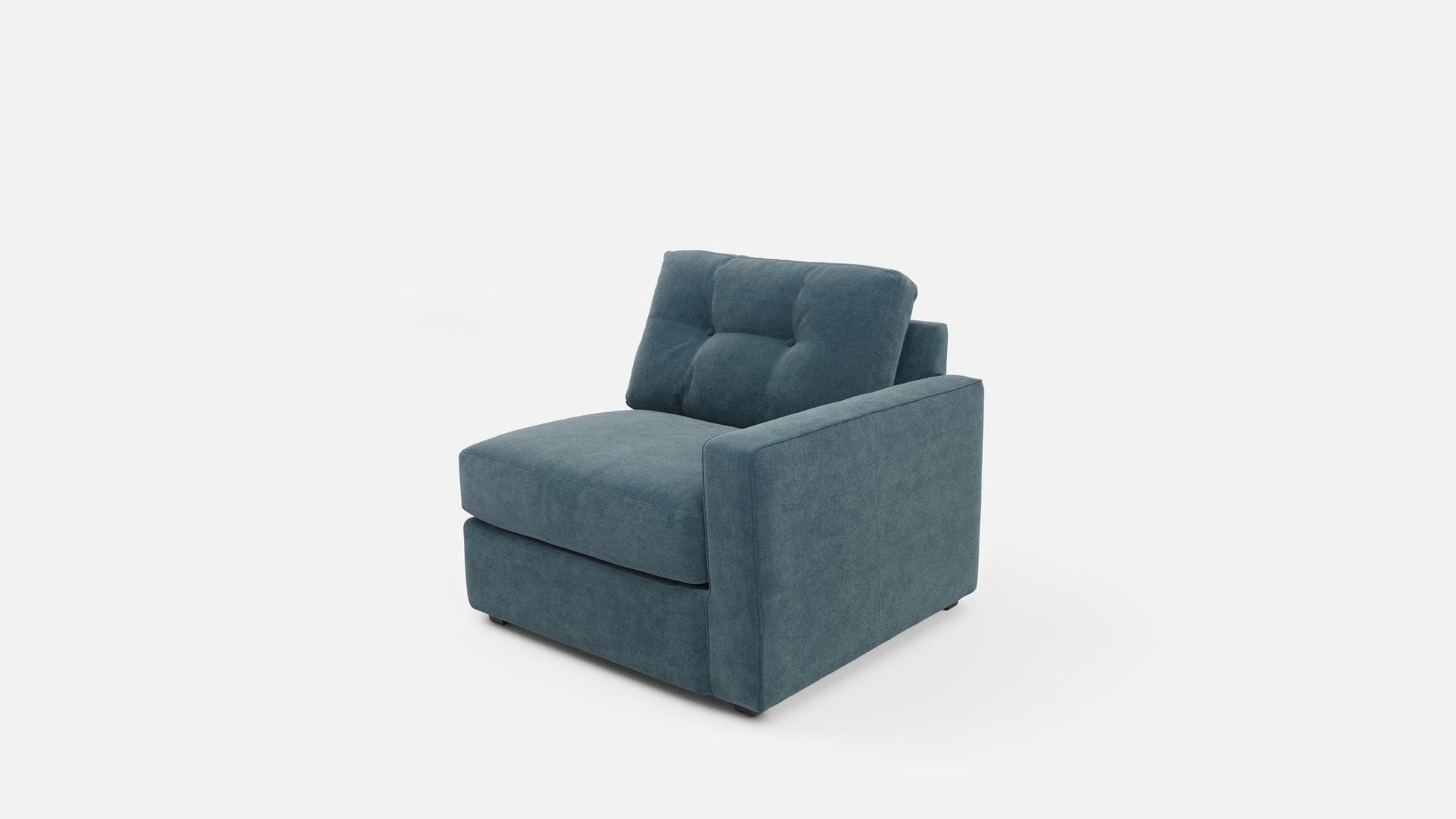Modular chair in teal fabric with deep seat, rounded front edge, and tall back.