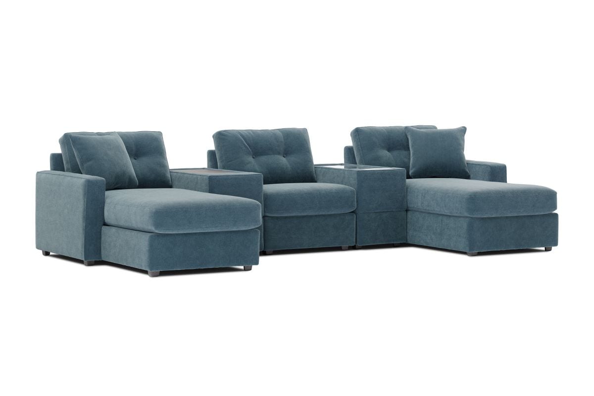 Teal theater sectional with dual chaise configuration and deep tufted seat cushions.