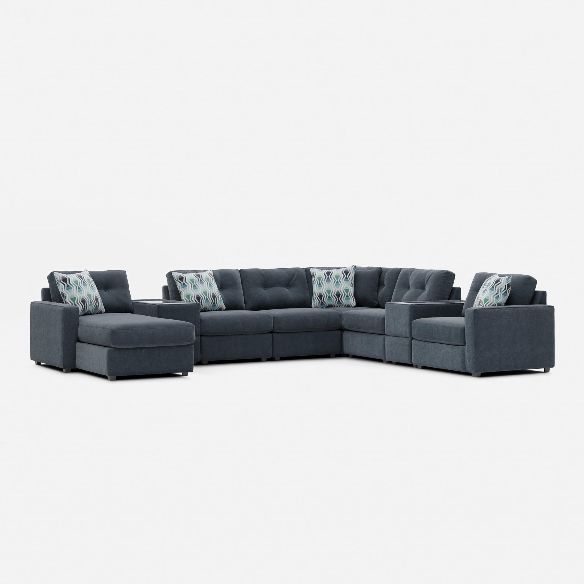 Dark gray modular sectional sofa with patterned accent pillows and square arms