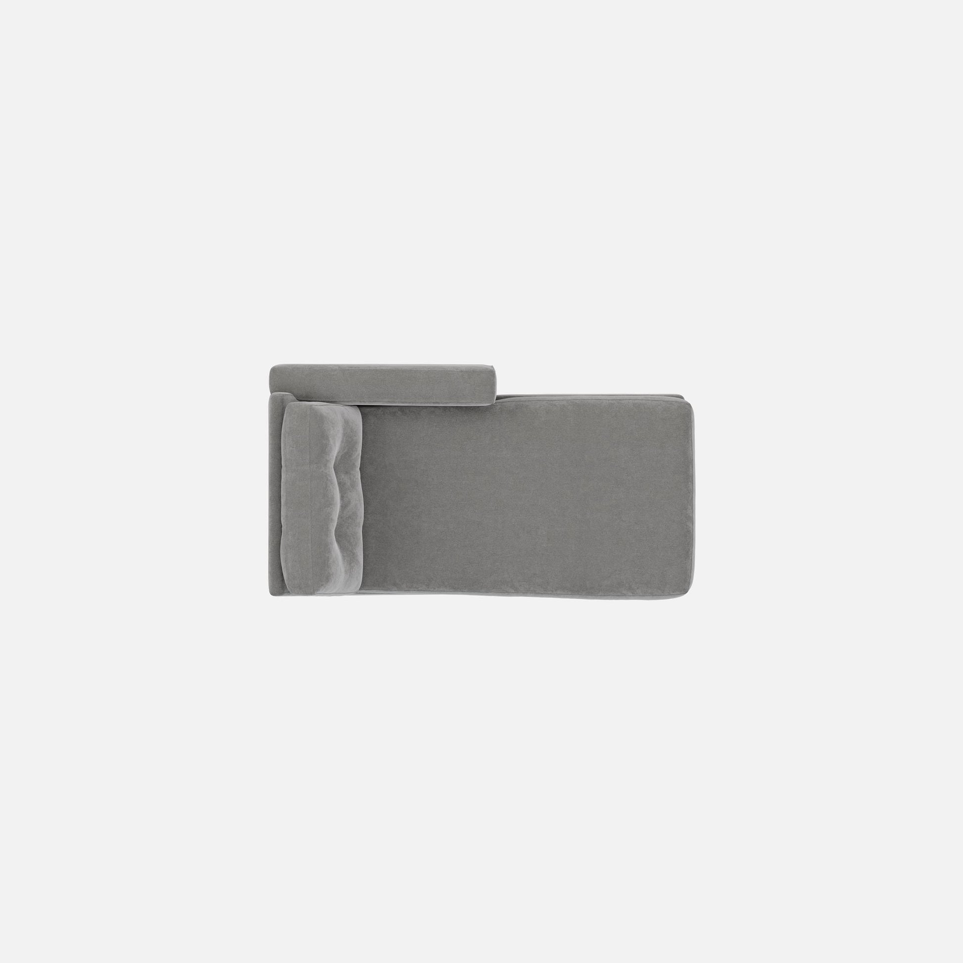 Gray chaise seat and backrest end panels, fabric upholstery close-up