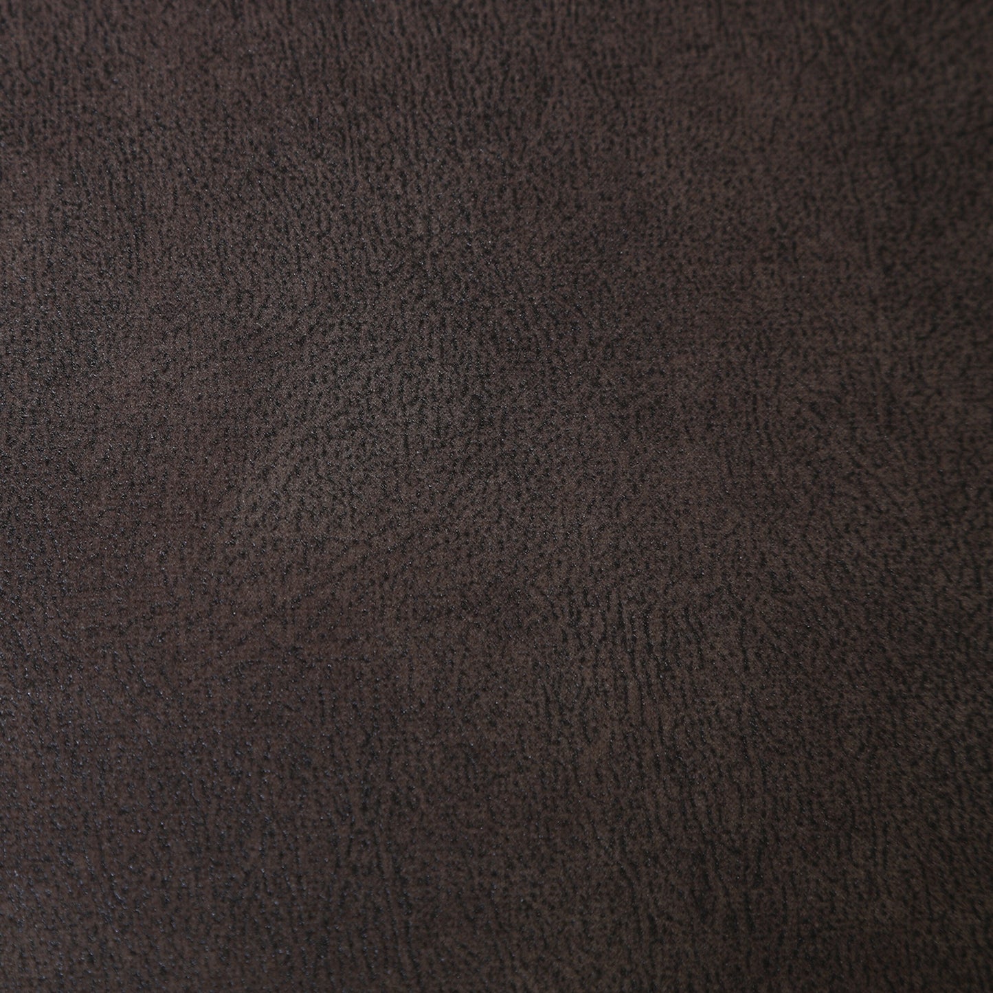 Brown textured upholstery close-up with fine grain pattern.