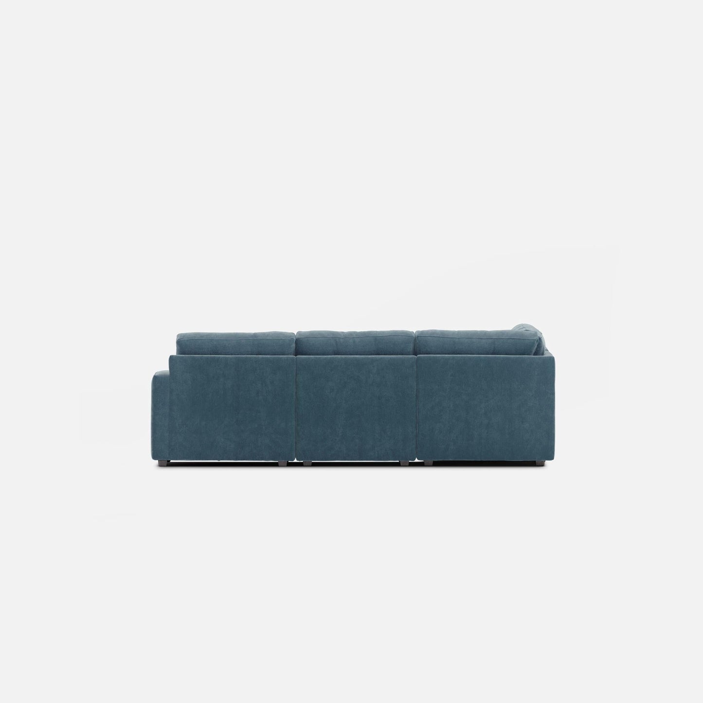Teal modular sectional sofa with squared seat cushions and low back height.