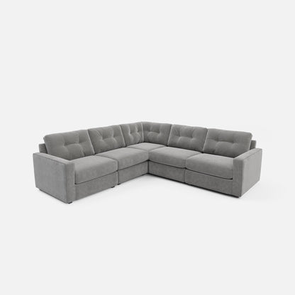 Light gray modular sectional sofa L-shape with tufted back and boxy seat cushions