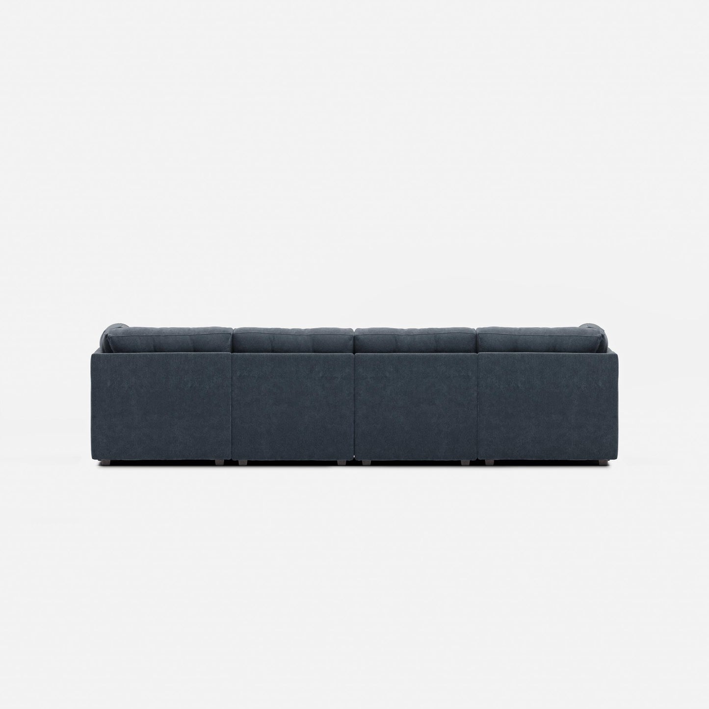 Navy fabric modular sectional sofa with padded arms, back, and four seat blocks