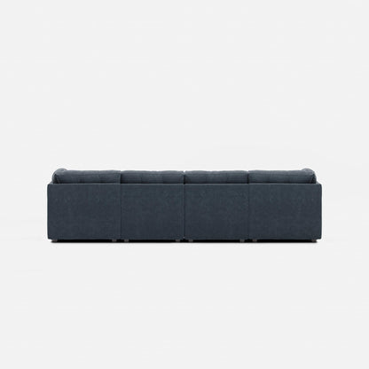 Navy fabric modular sectional sofa with padded arms, back, and four seat blocks