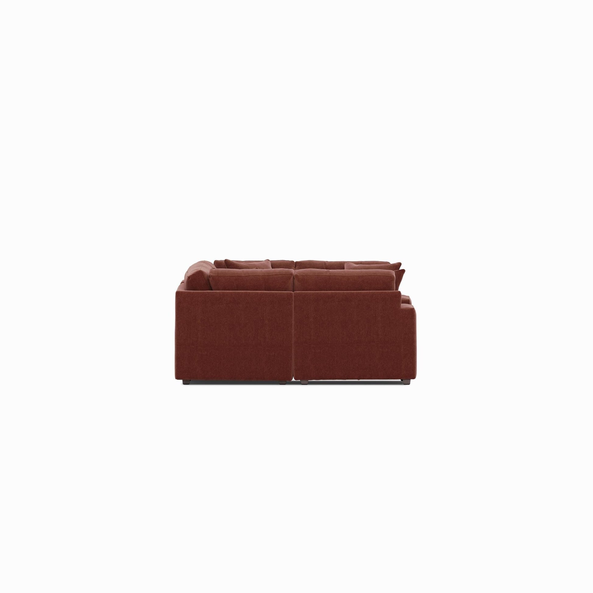 Dark red 6-piece sectional sofa with tufted back cushions and two-seat chaise end