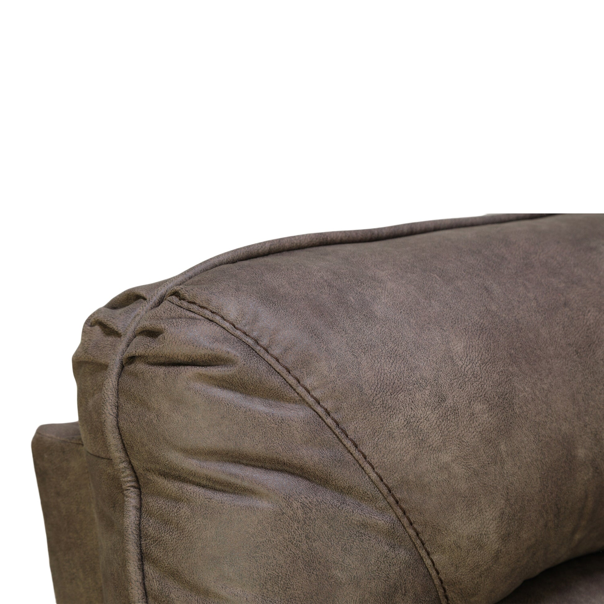 Wall-hugging power recliner armrest close-up with dark brown faux leather stitching
