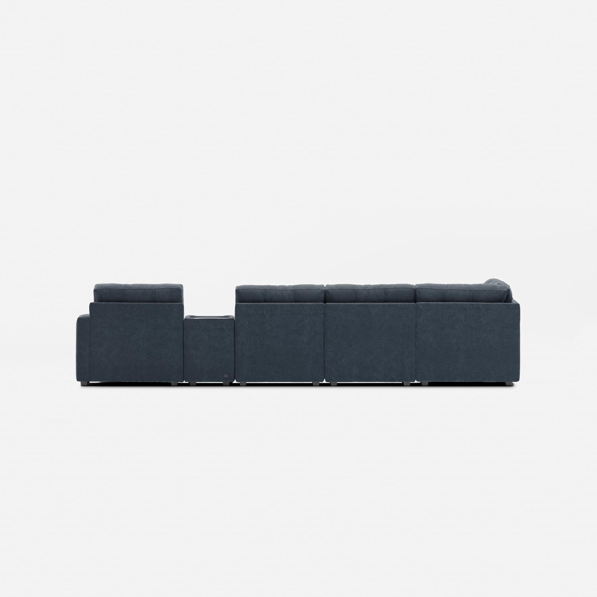 Dark blue modular sectional sofa with low profile and back cushions