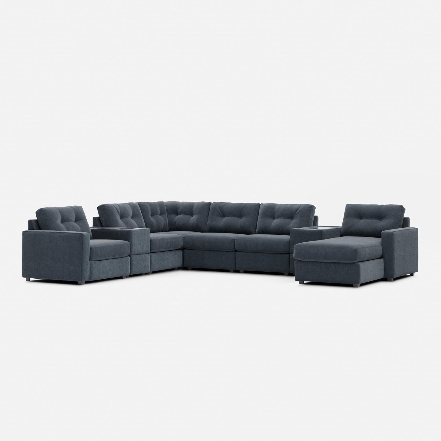 Medium gray modular sectional sofa with tufted back cushions and right-side chaise section