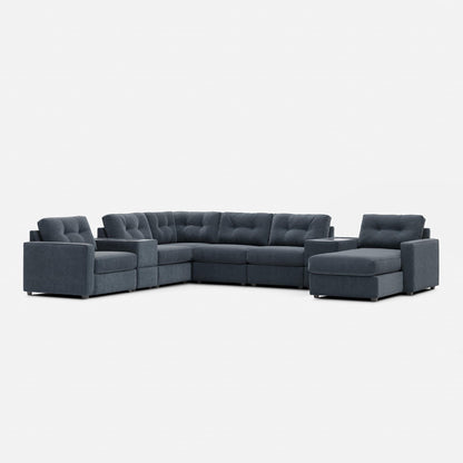 Medium gray modular sectional sofa with tufted back cushions and right-side chaise section