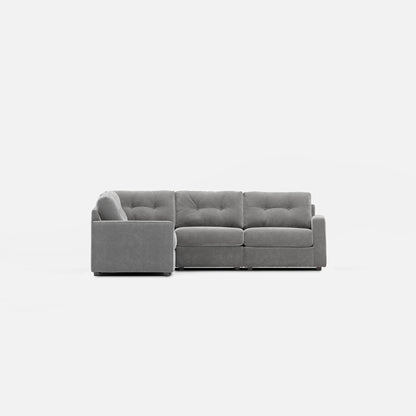 Gray modular sectional sofa with left chaise end, square arms, and tufted back